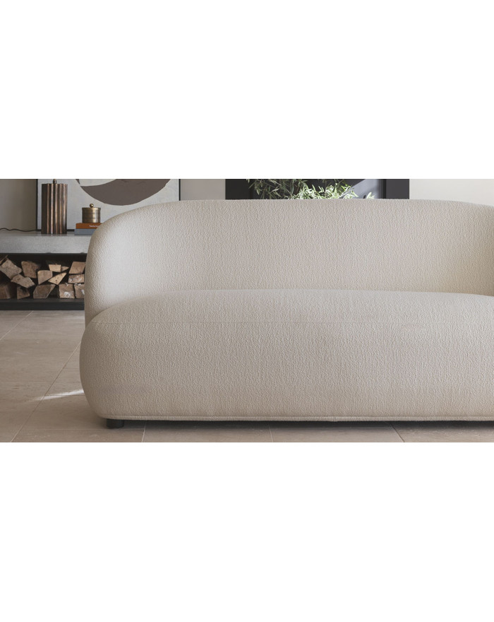 Canapé design arrondi en tissu bouclette crème Lisette