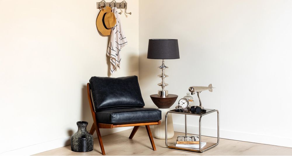 Fauteuil cuir noir vintage Marnet